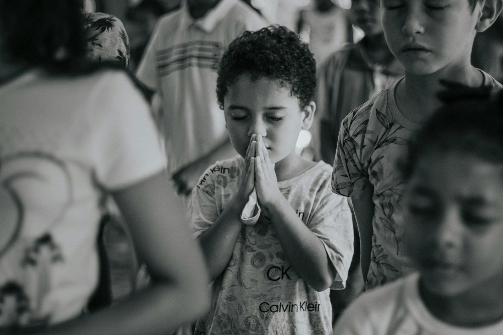 Children gathered in prayer